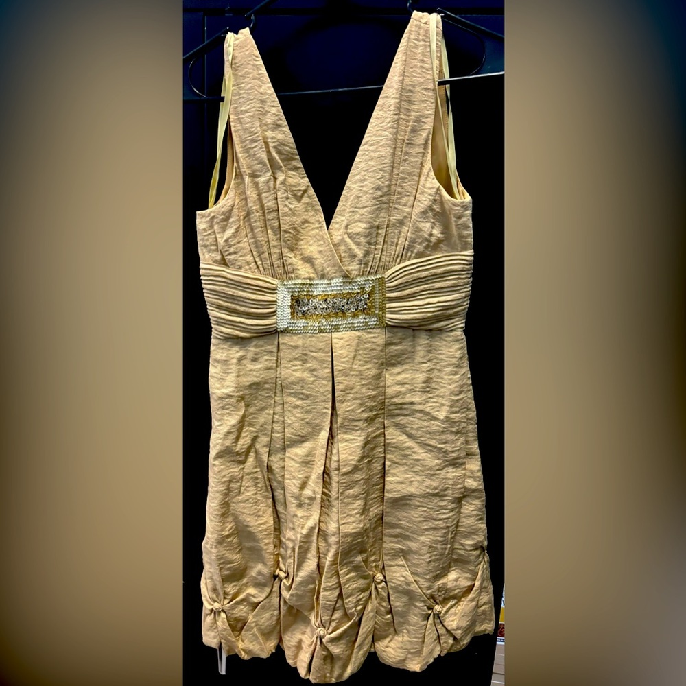Elegant nude little beads cocktail dress. Great condition.